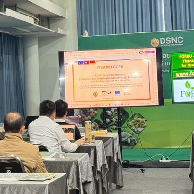 GIZ Lao participant shared thier forest restoration project .