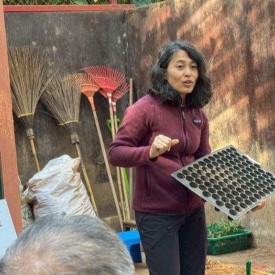 Archarn Dia explained the process of producing seedlings in the nursery.